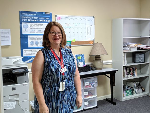 Teacherpreparingmaterialsforherclass Employment Opportunities at Haywood Christian Academy